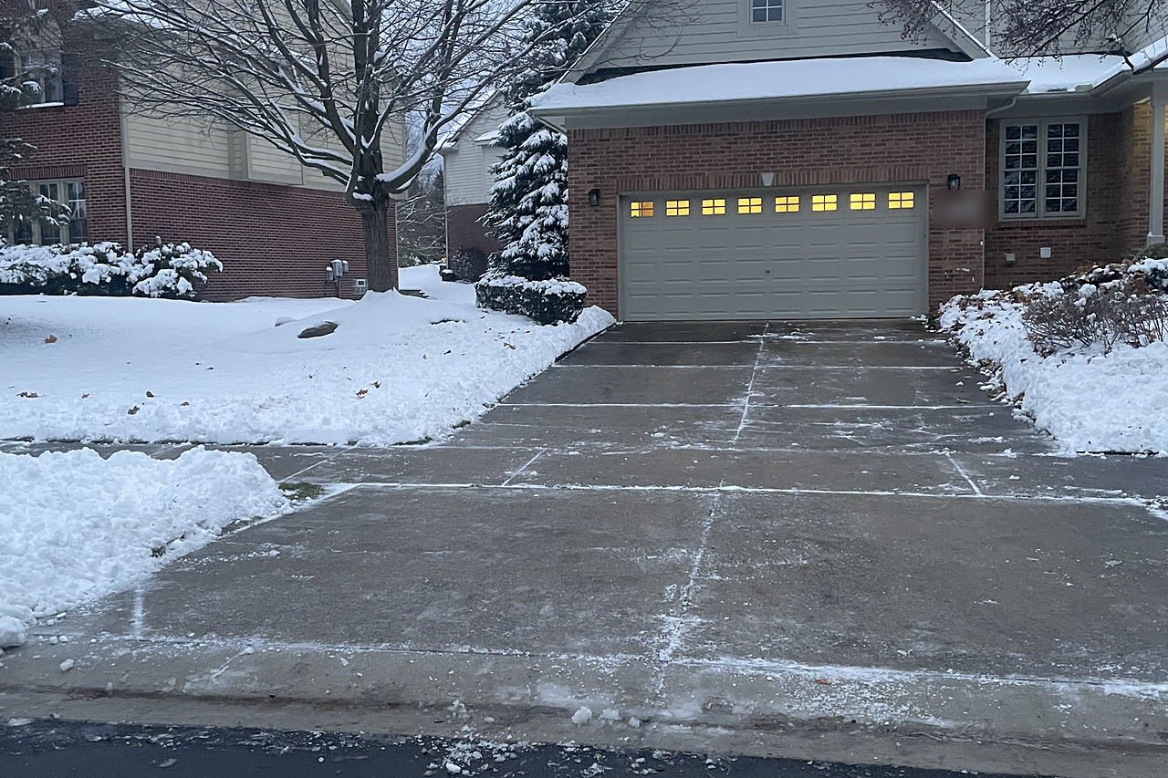 The same driveway cleared down to the pavement